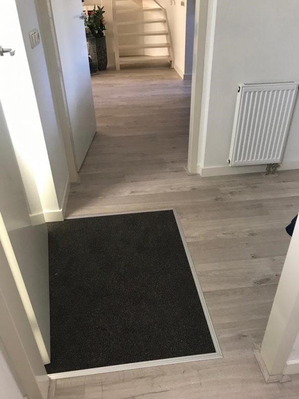 Waterdichte Quick-Step laminaat gelegd in Schoonebeek